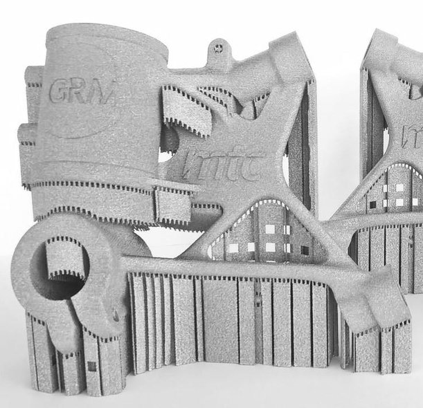 Image of the printed part with support structures © MTC
